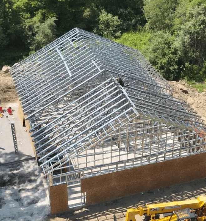 Aerial view of steel frame barndominium construction in Georgia